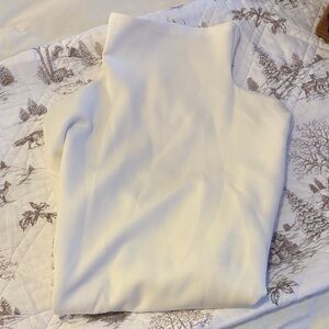 Buffbunny Cream Turtleneck